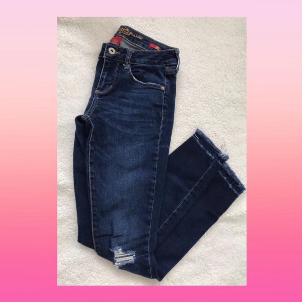 Ripped dark denim jeans